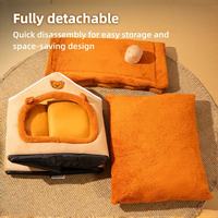 Fully detachable orange cat house with roof, cushion and base separated for easy storage.