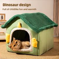 Green dinosaur-shaped plush cat house with a cat resting inside, cute enclosed pet bed.