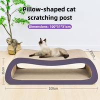 Streamlined extra large cat scratcher bed with cats resting on top and inside